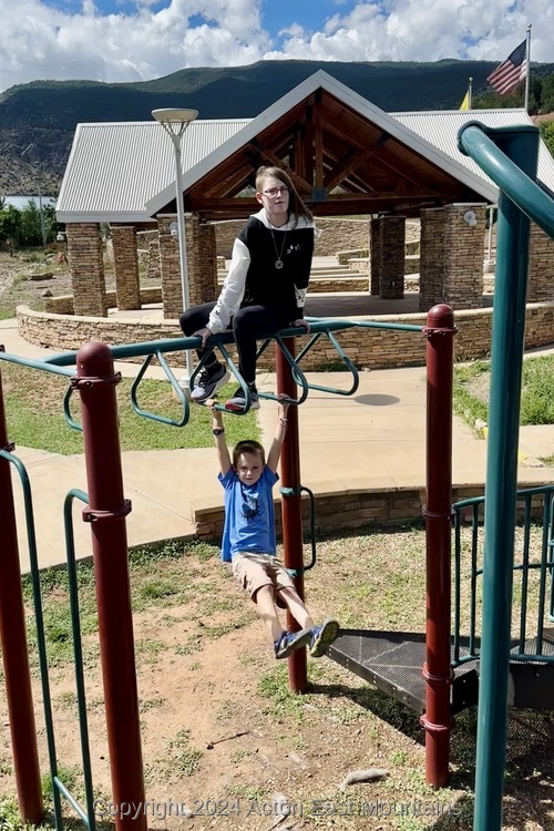 Learners at Acton Academy East Mountains private school in Cedar Crest, New Mexico on a field trip to the Tijeras library.