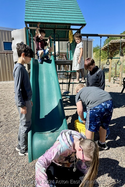 Learners at Acton Academy East Mountains private school in Cedar Crest, New Mexico playing outside.